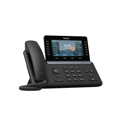 Téléphone IP Android Yealink T85W installé sur un bureau professionnel moderne